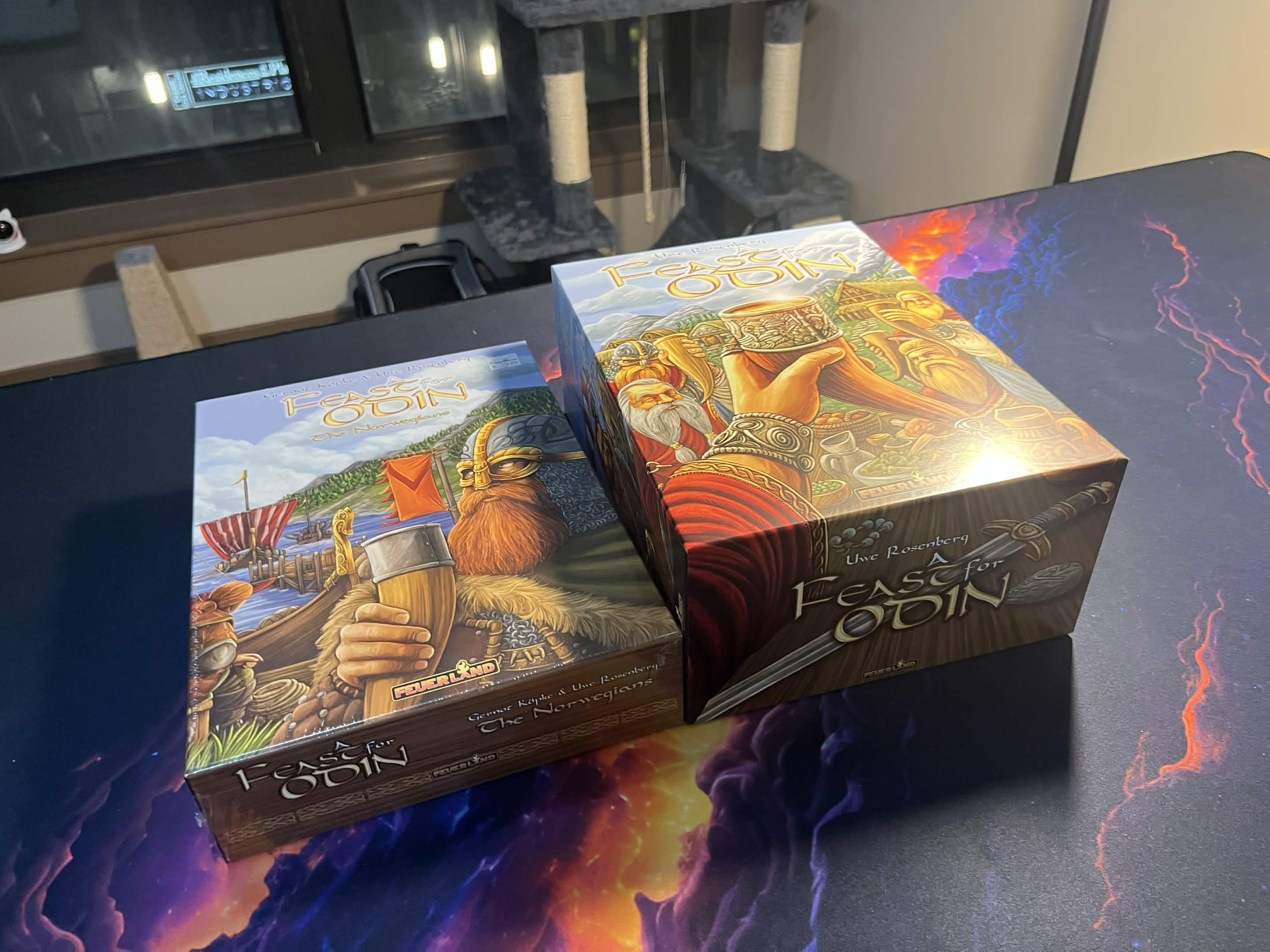 A Feast for Odin base game and Norwegians expansion boxes on my gaming table