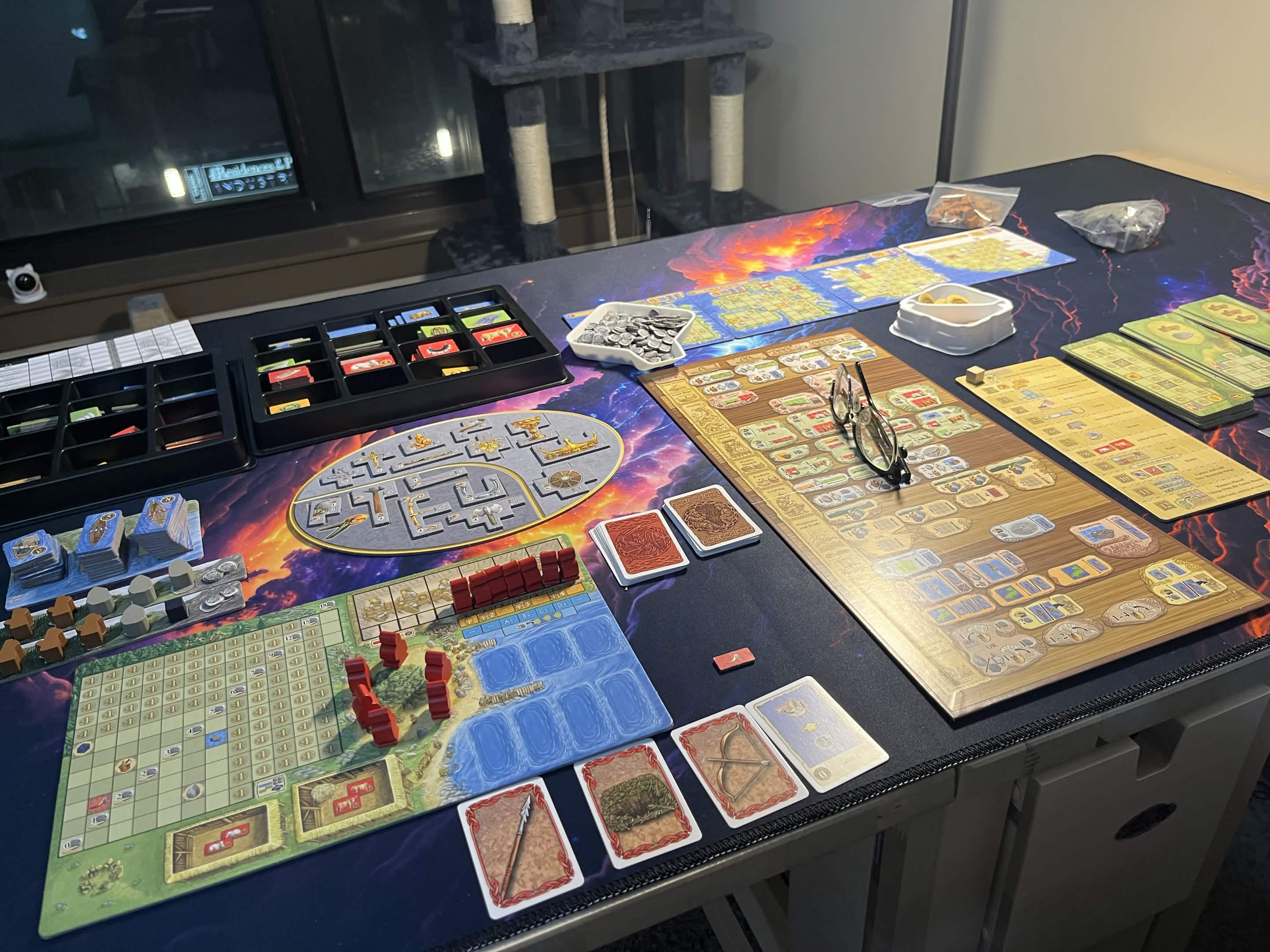A Feast for Odin mid-game - home board with polyomino tiles, action board, and supply boards